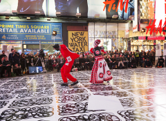 Two people performing in a Street Opera in Times Square